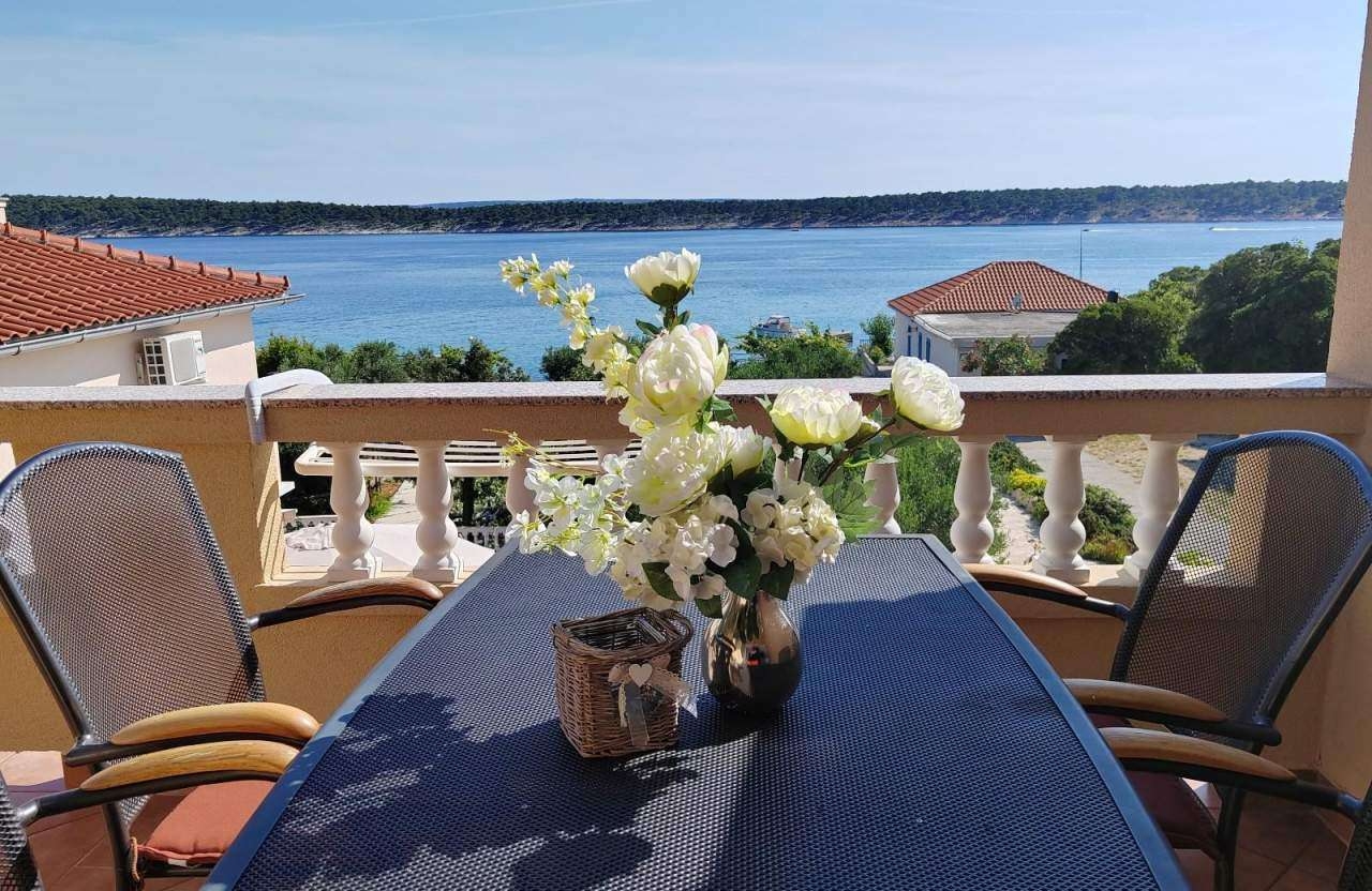 Two bedroom apartment near beach Barbat, Rab (A-22561-b)