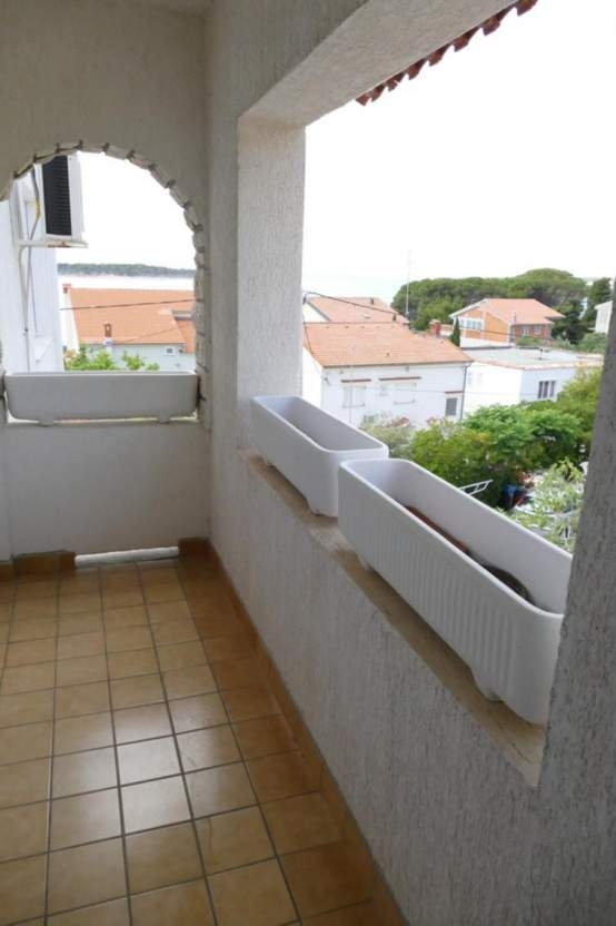 Two bedroom apartment with terrace and sea view Barbat, Rab  A-a