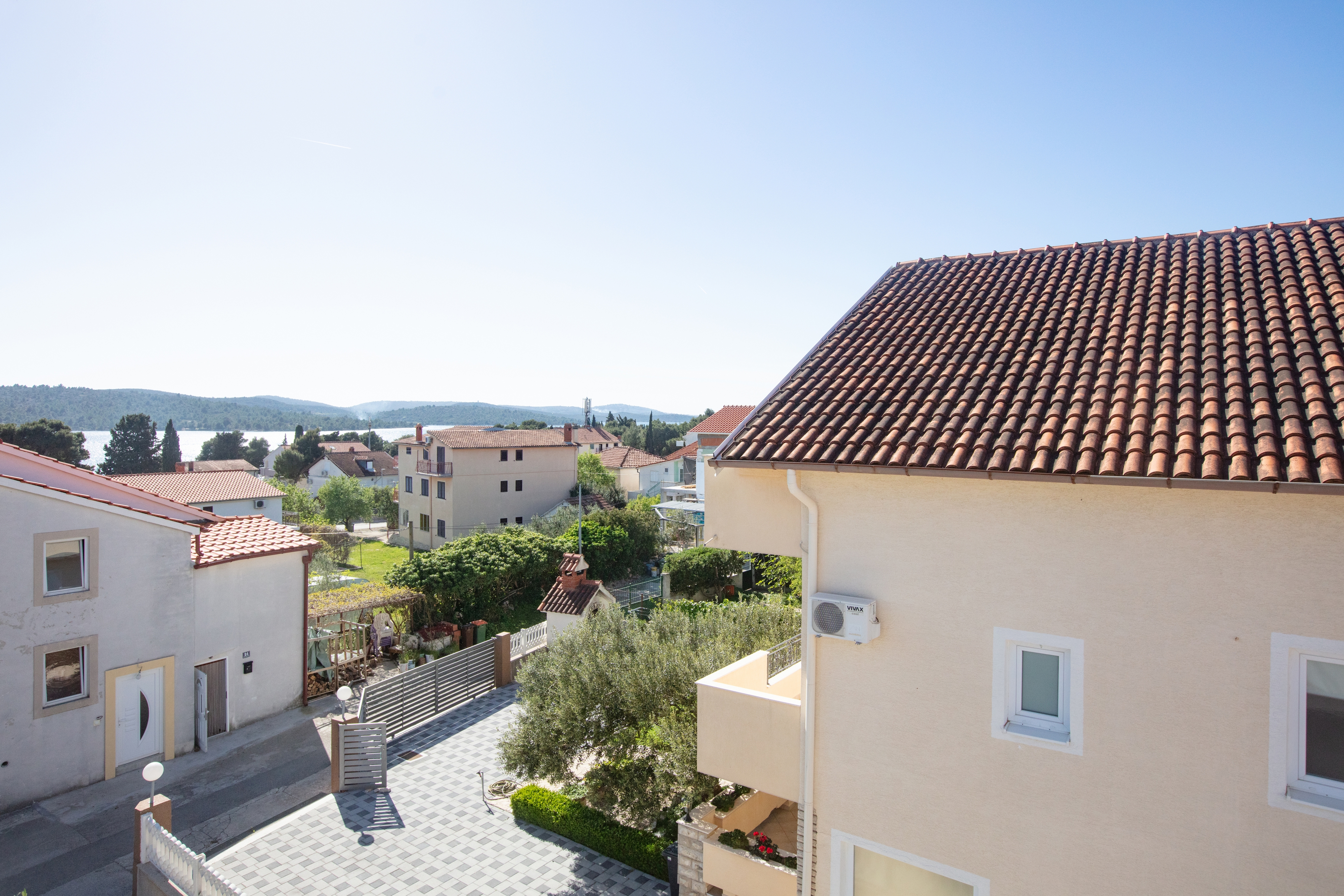 Three bedroom apartment with balcony and sea view Pirovac, Šibenik  A-c