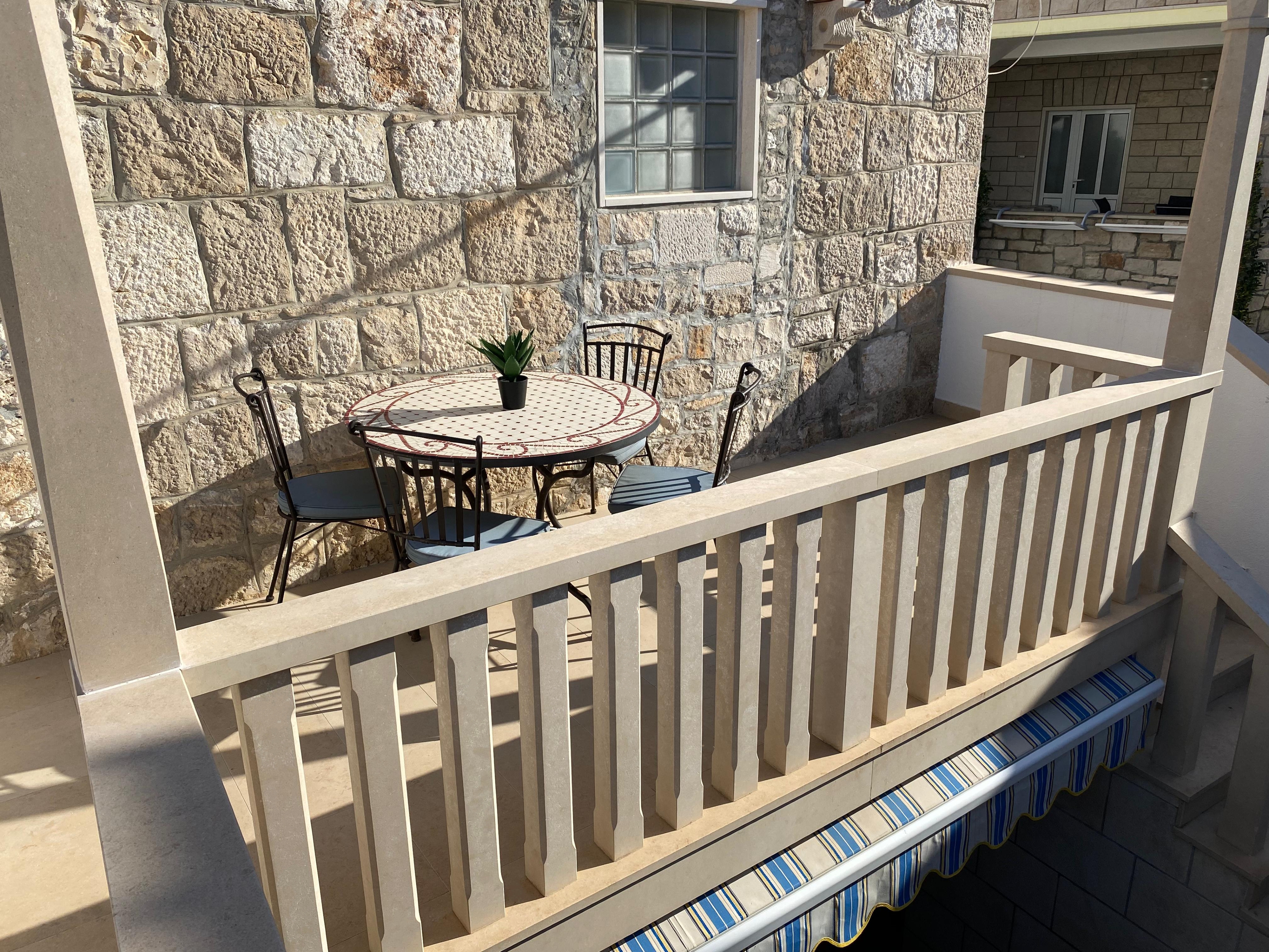 Two bedroom house with terrace and sea view Postira, Brač  K