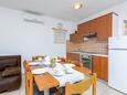 Medulin, Comedor in the apartment, air condition available y WiFi.