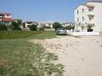 Povljana, Pag, Parkeerplaats 229 - Appartementen with sandy beach.