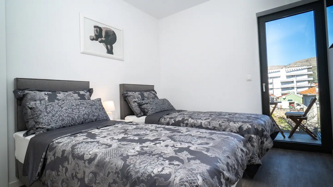 Three bedroom apartment near beach Seget Donji, Trogir  A-a