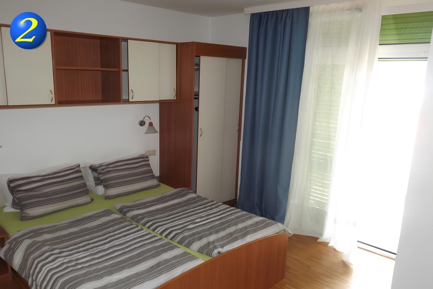 Room with balcony and sea view Supetarska Draga - Donja (Rab) (S-23068-b) Room with balcony and sea view Supetarska Draga - Donja (Rab) (S-23068-b)