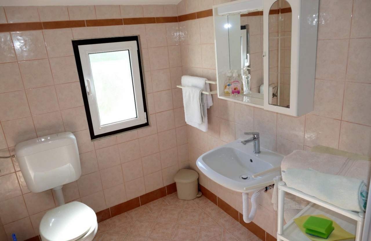 Two bedroom apartment with terrace and sea view Barbat, Rab  A-a