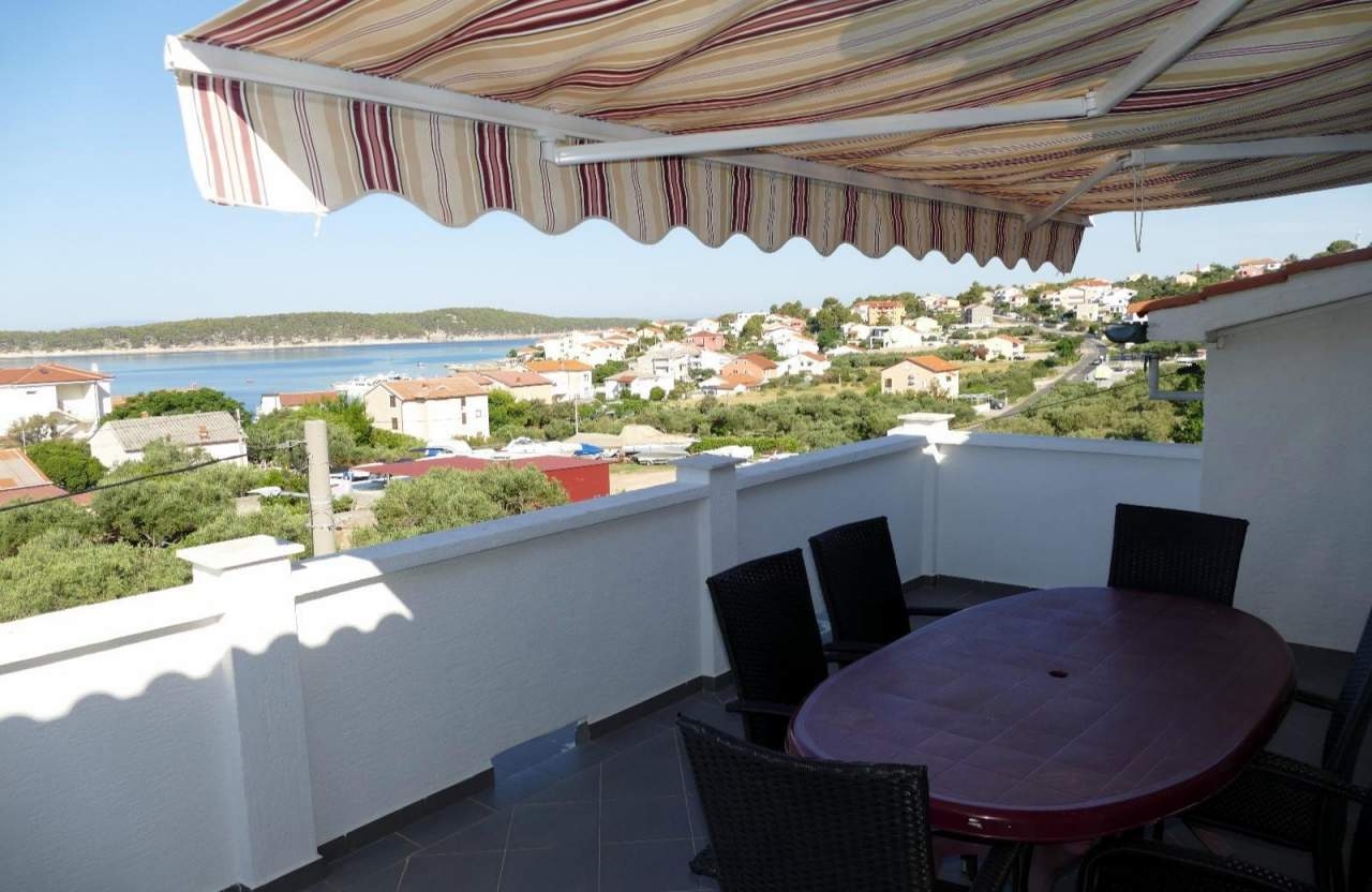 Two bedroom apartment with terrace and sea view Barbat, Rab (A-23180-a) Two bedroom apartment with terrace and sea view Barbat, Rab (A-23180-a)