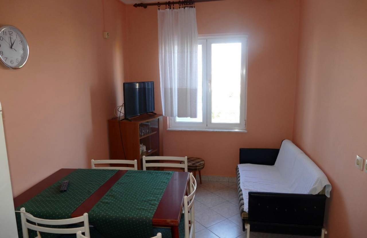 Two bedroom apartment with terrace and sea view Barbat, Rab (A-23180-b)