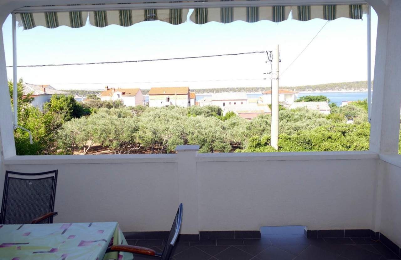 Two bedroom apartment with terrace and sea view Barbat, Rab  A-b