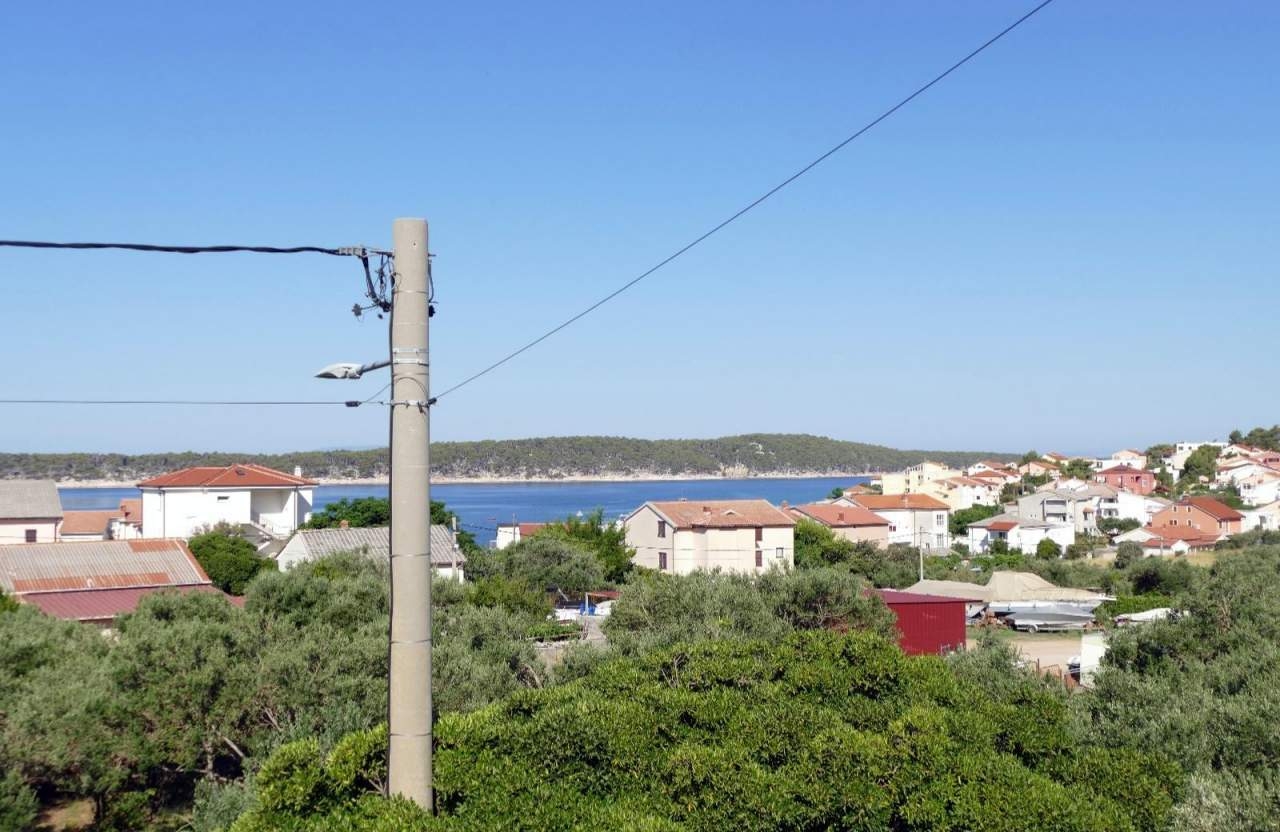 Two bedroom apartment with terrace and sea view Barbat, Rab  A-b