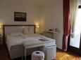 Ložnice Lovran, Ložnice v ubytování typu room, s klimatizací a WiFi.