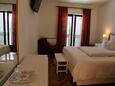Ložnice Lovran, Ložnice v ubytování typu room, s klimatizací a WiFi.