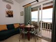 Selce, Dining room in the apartment, air condition available and WiFi.