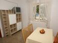 Šimuni, Jídelna v ubytování typu apartment, s klimatizací a WiFi.