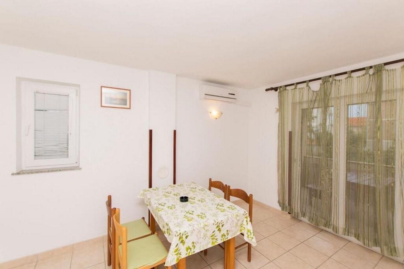 Two bedroom apartment with terrace Novalja, Pag (A-23663-a)