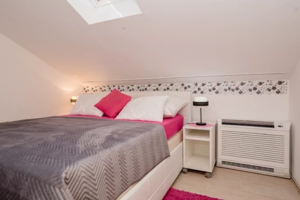 Two bedroom apartment with terrace and sea view Barbat, Rab (A-23817-c)