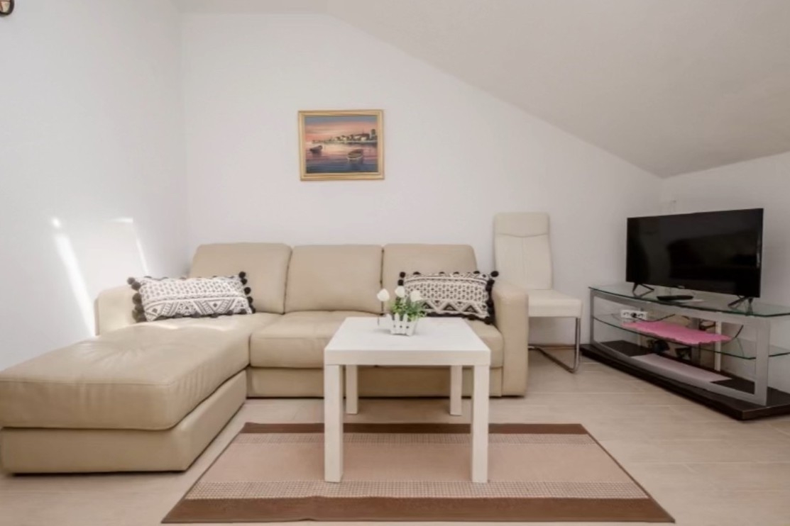 Two bedroom apartment with terrace and sea view Barbat, Rab (A-23817-c)