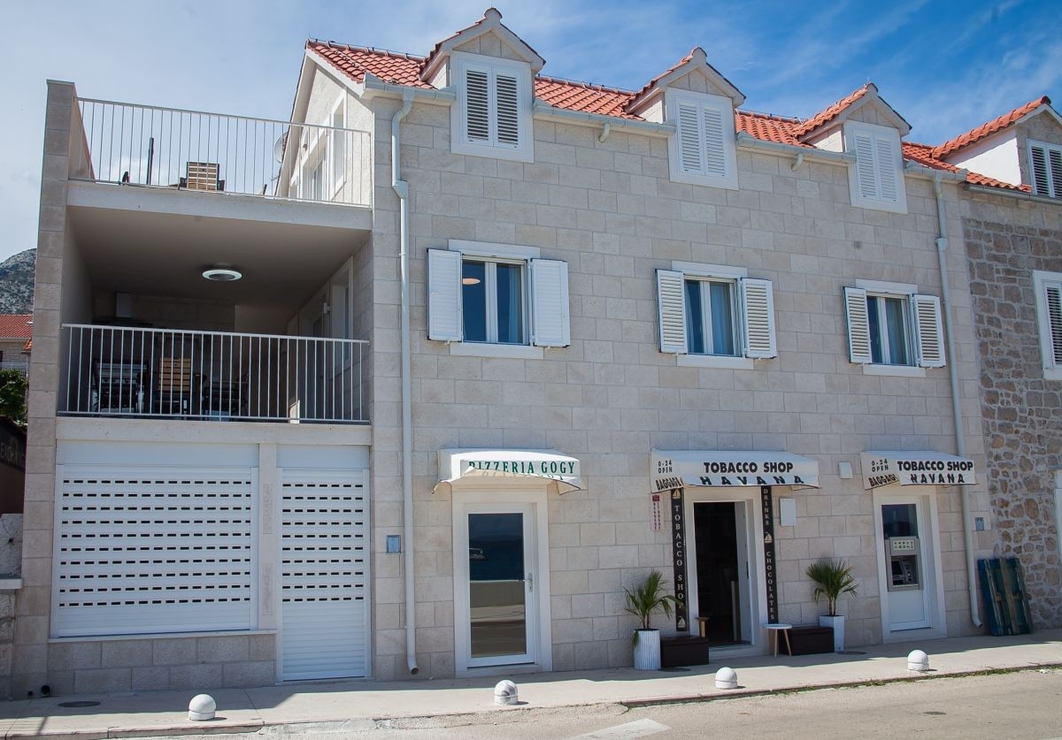 Three bedroom apartment with terrace and sea view Bol, Brač (A-23843-a)