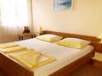 Ložnice 2 Dramalj, Ložnice 2 v ubytování typu apartment, s klimatizací, domácí mazlíčci povoleni a WiFi.