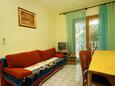 Povile, Living room 1 in the apartment, air condition available, (pet friendly) and WiFi.