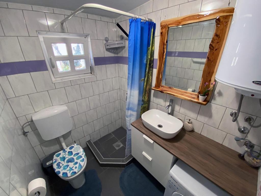 Two bedroom house with terrace and sea view Sveti Jakov, Lošinj  K