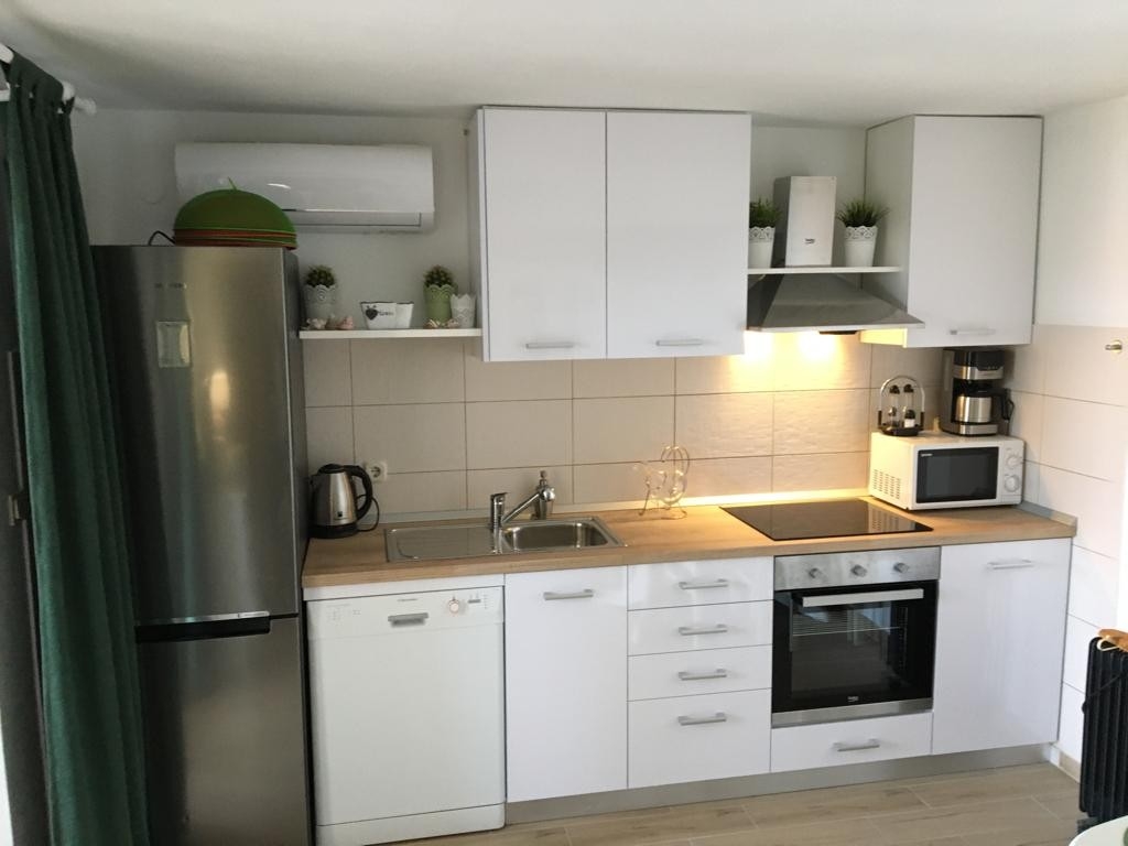 Two bedroom apartment with terrace and sea view Puntinak, Brač  A-c
