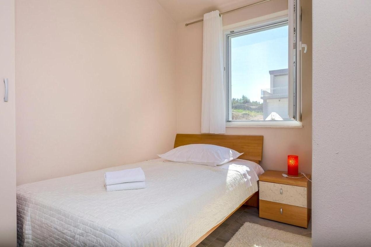 Two bedroom apartment with balcony and sea view Ražanj, Rogoznica  A-a