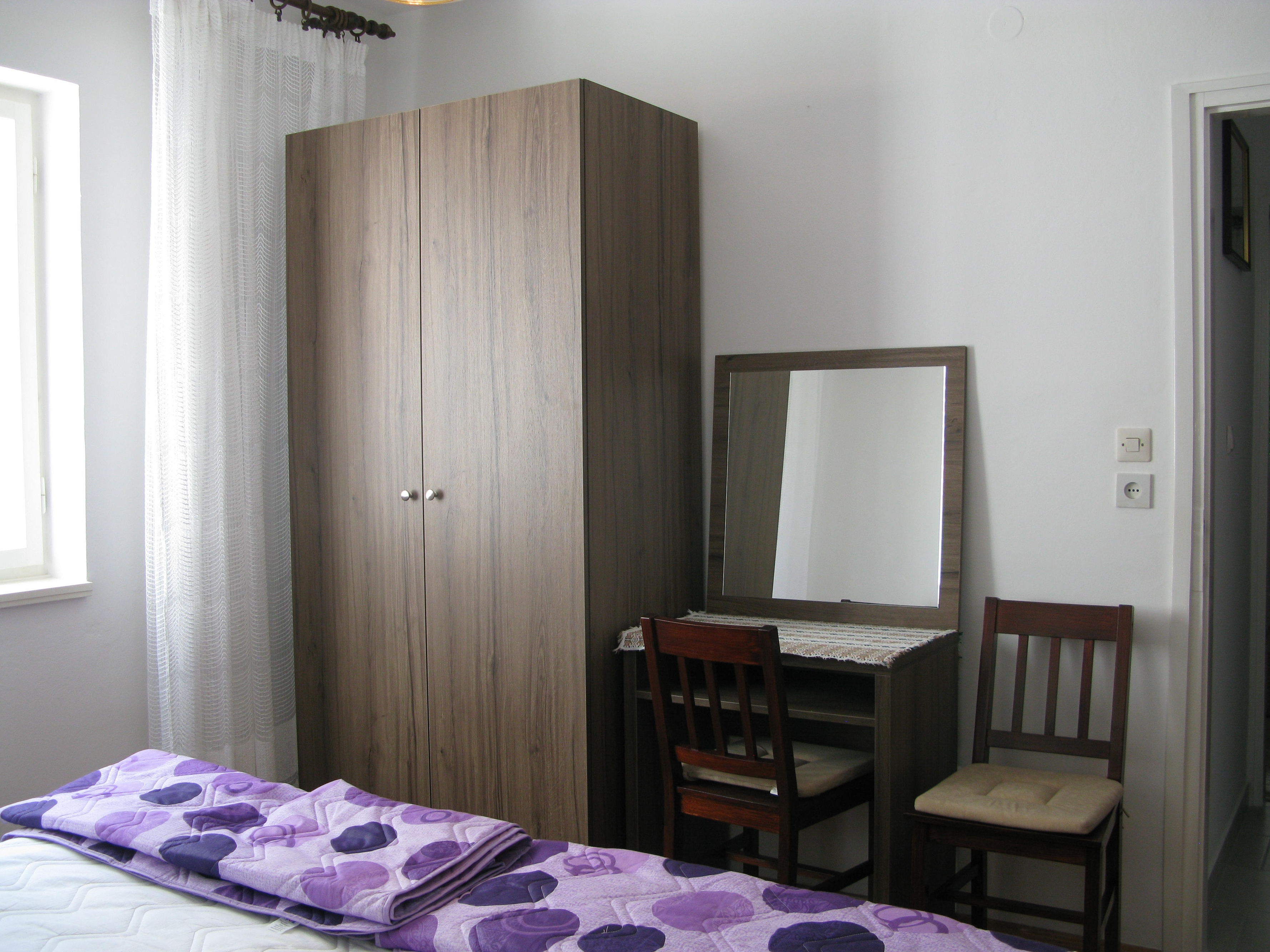 Two bedroom apartment with terrace and sea view Barbat, Rab  A-a