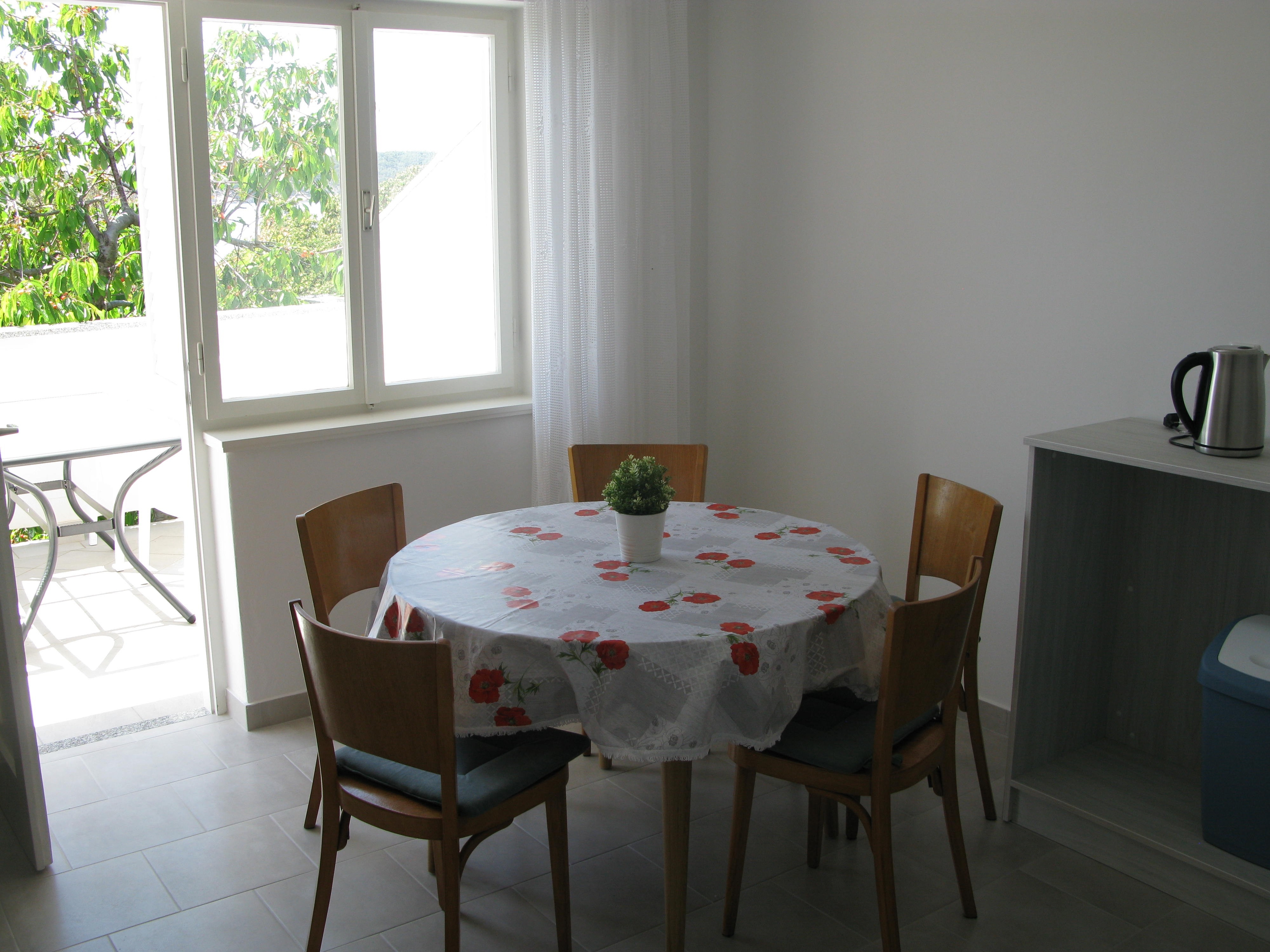 Two bedroom apartment with terrace and sea view Barbat, Rab  A-a
