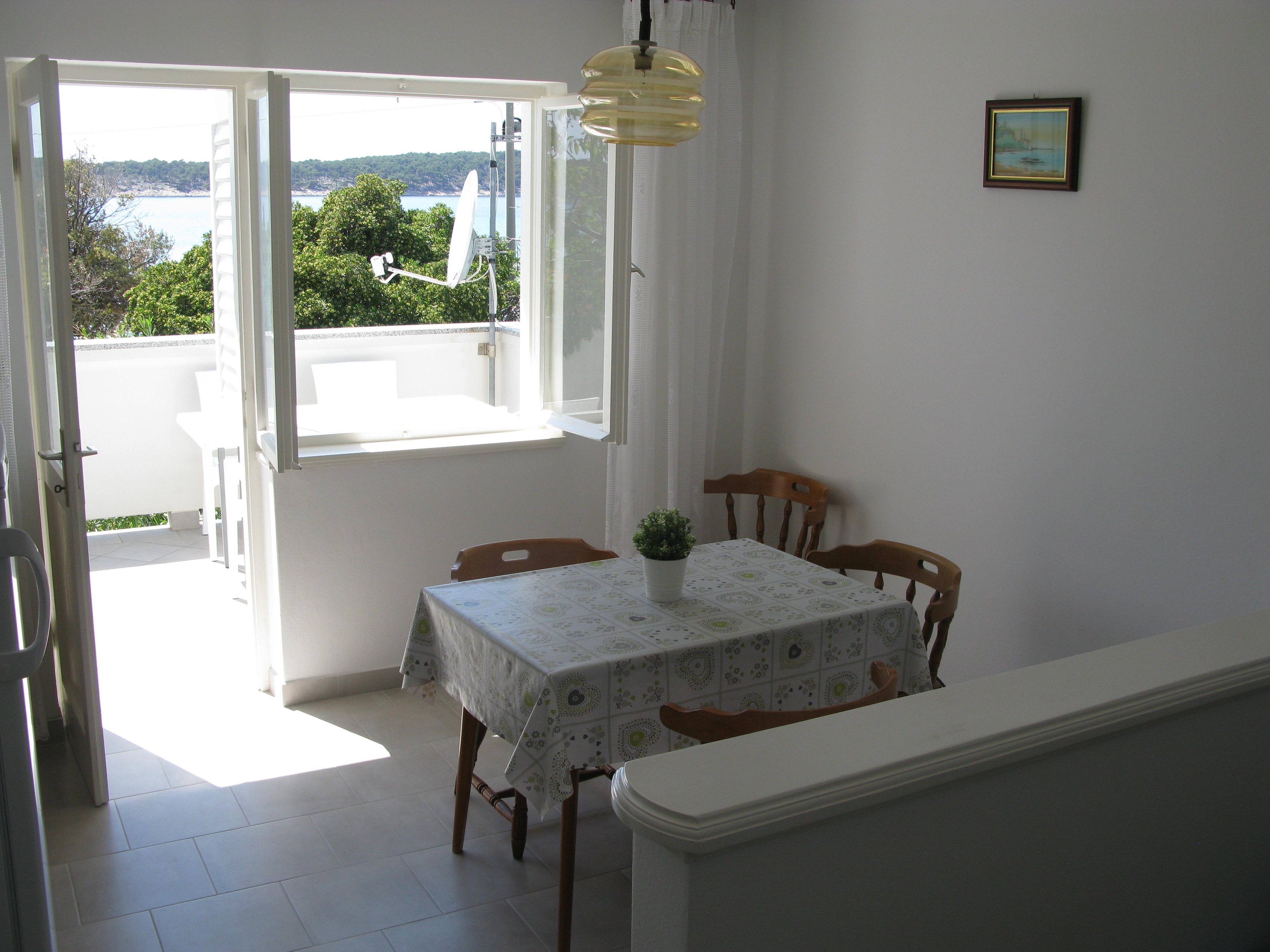 One bedroom apartment with terrace and sea view Barbat, Rab  A-b