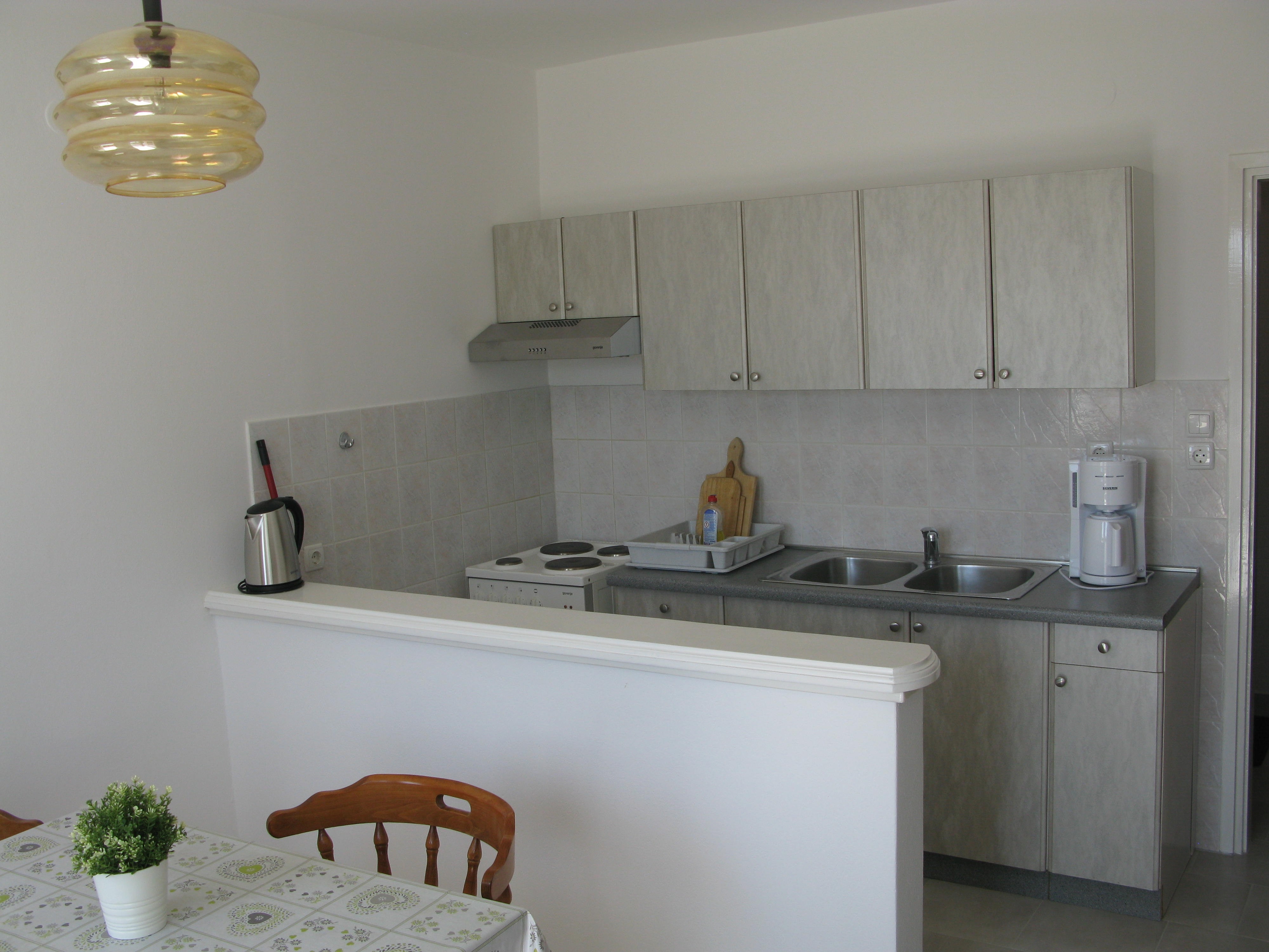 One bedroom apartment with terrace and sea view Barbat, Rab  A-b
