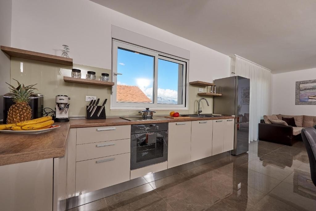 Three bedroom apartment with terrace and sea view Arbanija, Čiovo  A-a