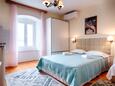 Komiža, Спальня в размещении типа studio-apartment, Домашние животные допускаются и WiFi.