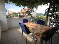Terrace Vis, Terrace in the studio-apartment, with a sea view, (pet friendly) and WiFi.