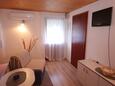 Obývací pokoj Vis, Obývací pokoj v ubytování typu studio-apartment, domácí mazlíčci povoleni a WiFi.