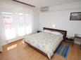 Ložnice Mali Lošinj, Ložnice v ubytování typu room, s klimatizací, domácí mazlíčci povoleni a WiFi.
