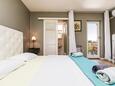 Mali Lošinj, Спальня в размещении типа room, доступный кондиционер и WiFi.