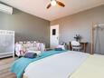 Mali Lošinj, Спальня в размещении типа room, доступный кондиционер и WiFi.