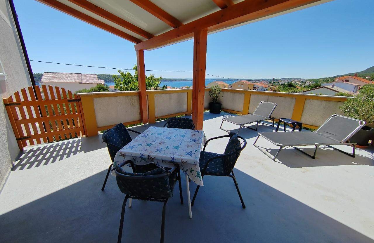 One bedroom apartment with terrace and sea view Barbat, Rab (A-25045-b) One bedroom apartment with terrace and sea view Barbat, Rab (A-25045-b)