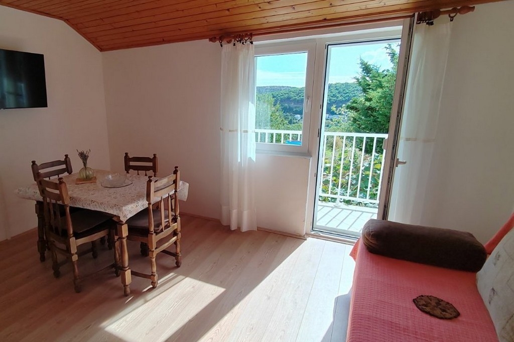 Two bedroom apartment with terrace and sea view Lopar, Rab (A-25086-a)