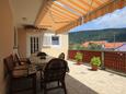 Cres, Terrace in the apartment, with a sea view, (pet friendly) and WiFi.