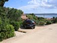 Nerezine, Lošinj, Parking 2518 - Appartement avec une plage de galets.