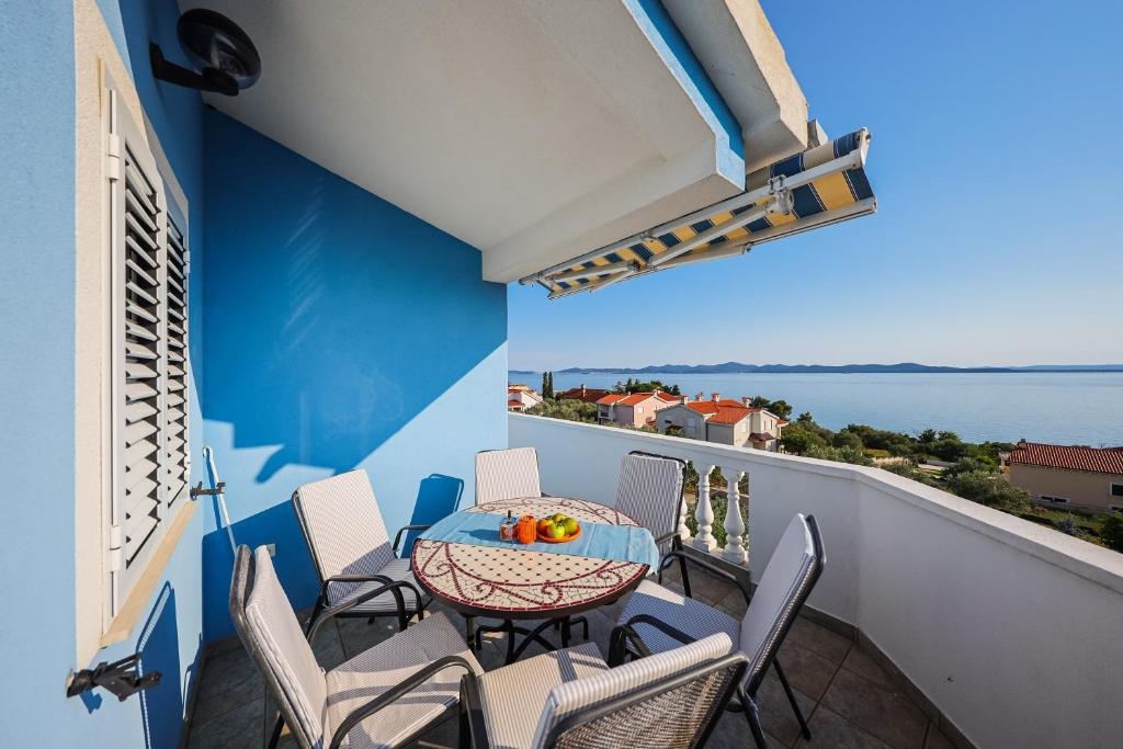 Two bedroom apartment with terrace and sea view Kožino, Zadar (A-25190-d)