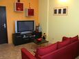 Slatine, Living room in the apartment, air condition available and WiFi.