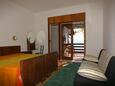 Ložnice Podgora, Ložnice v ubytování typu studio-apartment, s klimatizací a WiFi.
