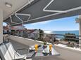 Baška Voda, Terrasse dans l’hébergement en type apartment, avec la vue sur la mer et WiFi.