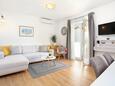 Living room Podgora, Living room in the apartment, air condition available and WiFi.