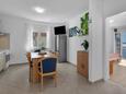 Podgora, Jídelna v ubytování typu apartment, s klimatizací a WiFi.