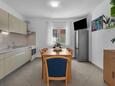 Podgora, Jídelna v ubytování typu apartment, s klimatizací a WiFi.