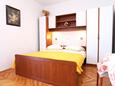 Promajna, Ložnice v ubytování typu studio-apartment, s klimatizací a WiFi.