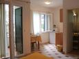 Dining room Zaostrog, Dining room in the studio-apartment, air condition available, (pet friendly) and WiFi.